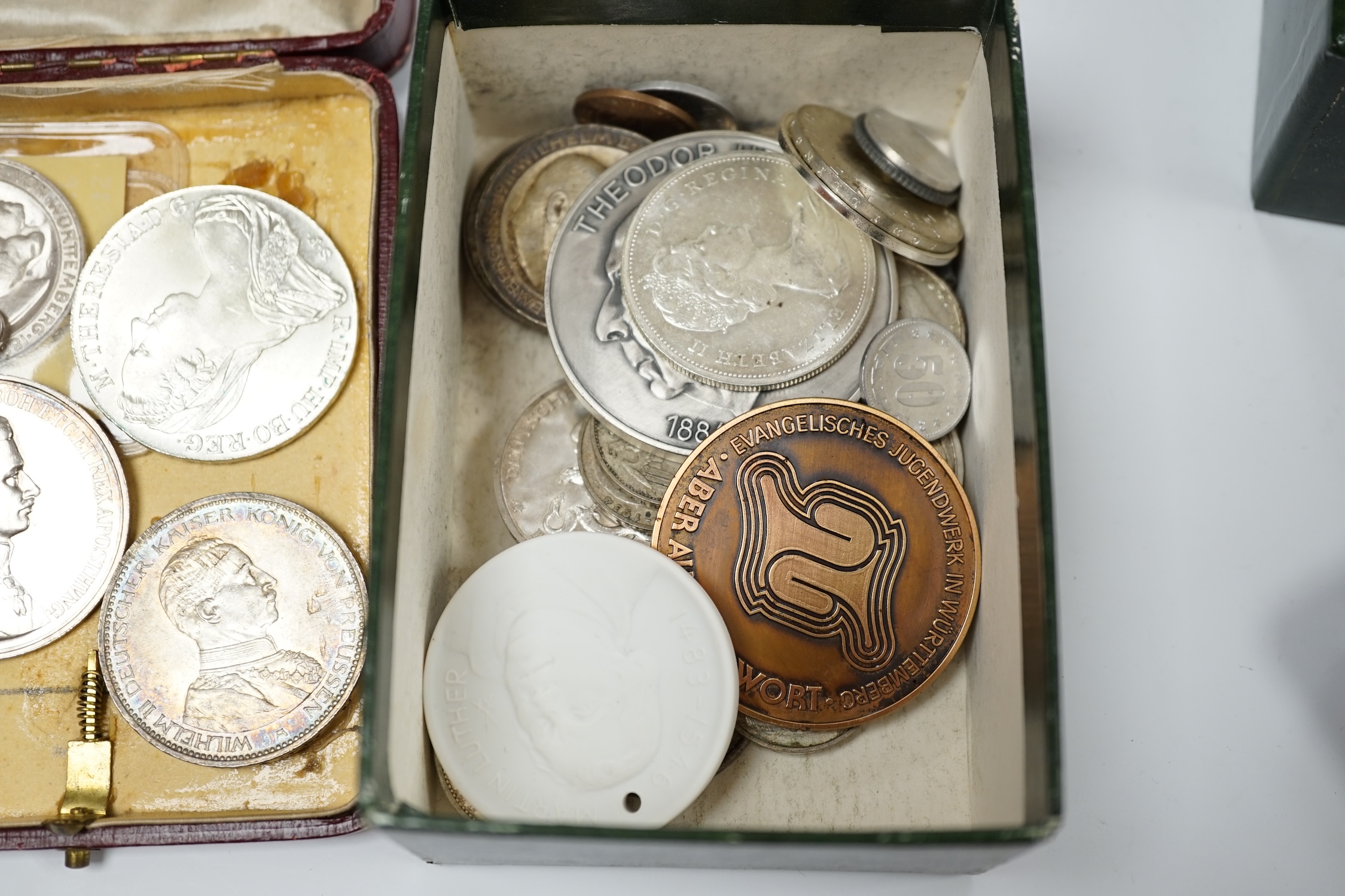 German and world coins, to include Württemberg Three Marks 1911, Prussia five marks 1914 etc., together with a Meissen biscuit porcelain Martin Luther commemorative medallion and two small boxes of coins. Condition - var